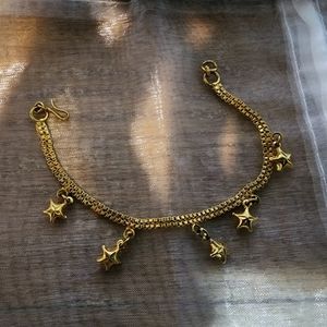 Gold star charm bracelet